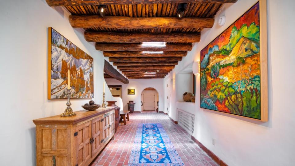 There are original wood beams and pops of color. - Credit: Herschel Mair