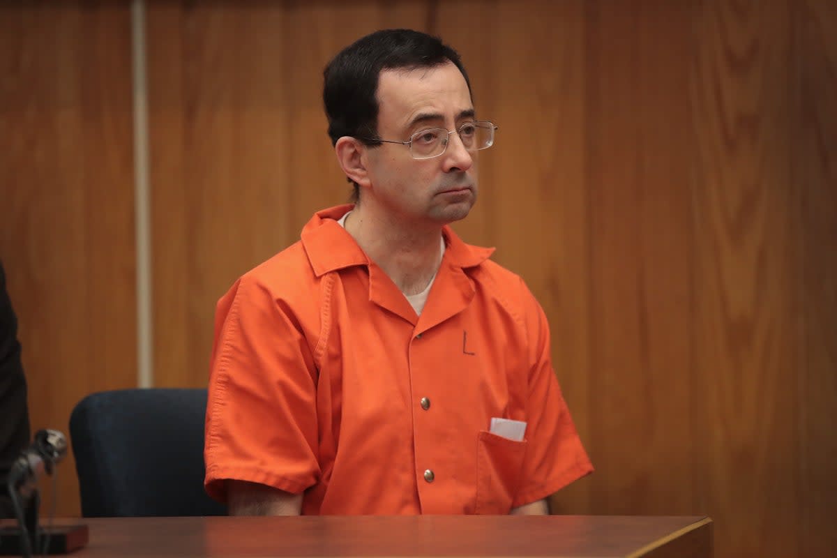 Larry Nassar sits in court listening to statements before being sentenced by Judge Janice Cunningham for three counts of criminal sexual assault in Eaton County Circuit Court on February 5, 2018 (Getty Images)