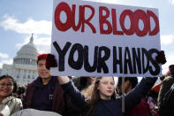 <p>Washington, DC High School student Sara Durbin joins with other students walking out of classes to demand stricter gun laws outside the U.S. Capitol in Washington, U.S., March 14, 2018. (Photo: Jim Bourg/Reuters) </p>