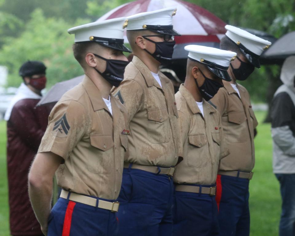 Marines stand at attention in front of a unit that includes high school seniors from Morris and Sussex counties, who are part of the delayed entry program to become Marines.  They were there to take part as Morris Plains celebrates their 35th annual Memorial Day Remembrance and Parade on May 29, 2021.