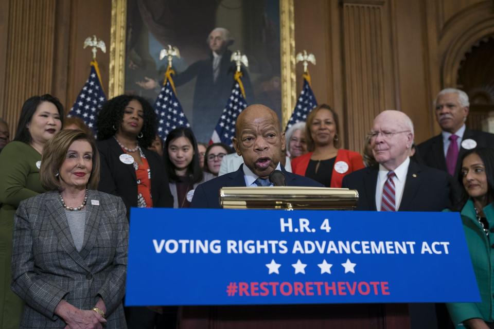 <span class="caption">Former U.S. Rep. John Lewis with House Democrats before passing the Voting Rights Advancement Act to eliminate potential state and local voter suppression laws, Dec. 29, 2019. The Senate has not taken up the bill.</span> <span class="attribution"><a class="link " href="http://www.apimages.com/metadata/Index/Congress-Voting-Rights/7544ee86afe644da81c12e4623974a4e/12/0" rel="nofollow noopener" target="_blank" data-ylk="slk:AP Photo/J. Scott Applewhite;elm:context_link;itc:0;sec:content-canvas">AP Photo/J. Scott Applewhite</a></span>