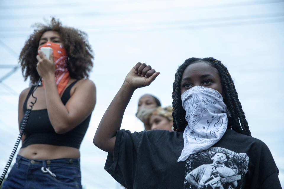 Protesters march from Kenton Park to the Portland Police Association in Portland, Ore., Thursday, Aug. 20, 2020. (Mark Graves/The Oregonian via AP)