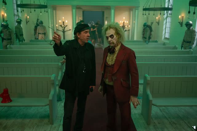 <p>Parisa Taghizadeh</p> Tim Burton on the set of 'Beetlejuice Beetlejuice' with Michael Keaton