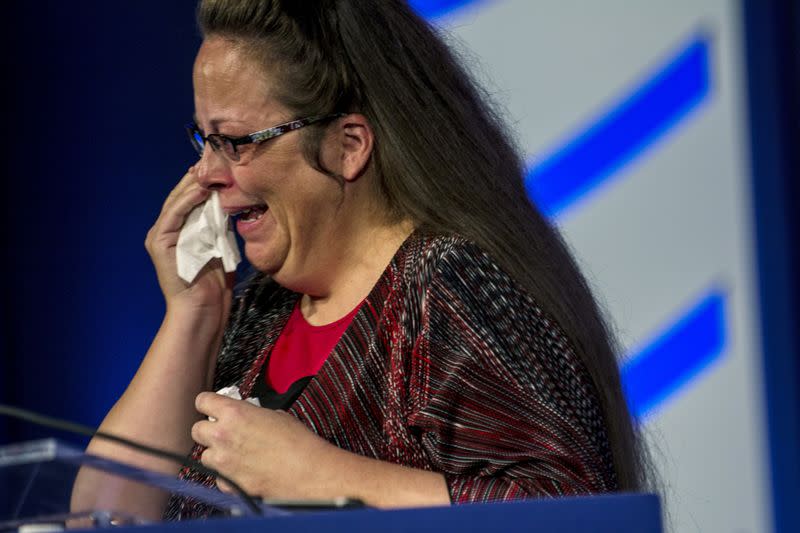 FILE PHOTO: Kentucky's Rowan County Clerk Kim Davis reacts as she receives the "Cost of Discipleship" award in Washington