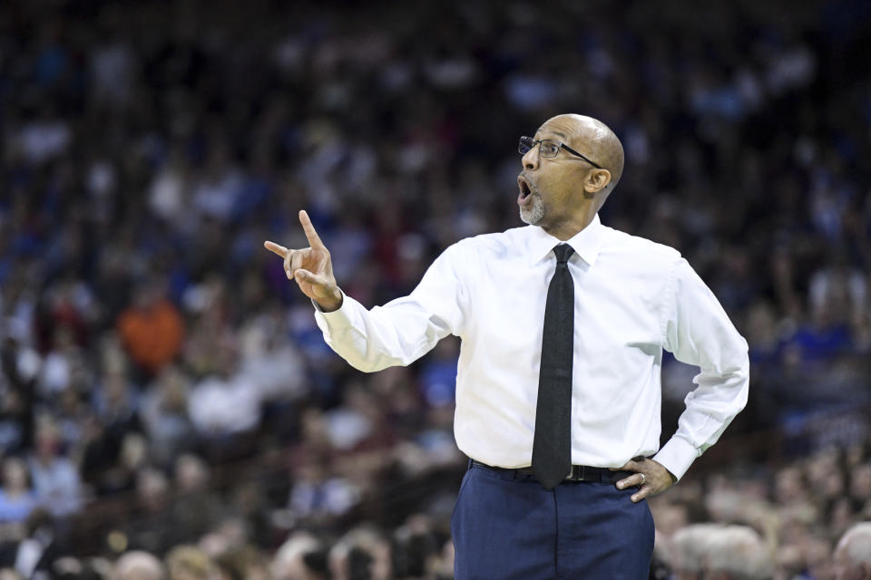 Central Florida head coach Johnny Dawkins communicates with players during the second half of a second-round game against Duke in the NCAA men's college basketball tournament Sunday, March 24, 2019, in Columbia, S.C. (AP Photo/Sean Rayford)