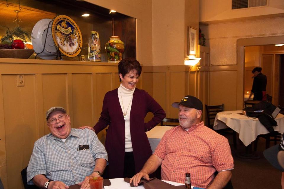 Patti Palamidessi jokes around with some of her regular customers, John and Tom Martin of Winters at Club Pheasant in West Sacramento in 2019. The restaurant, which closed in 2022, was established in 1935 in West Sacramento by her grandparents.