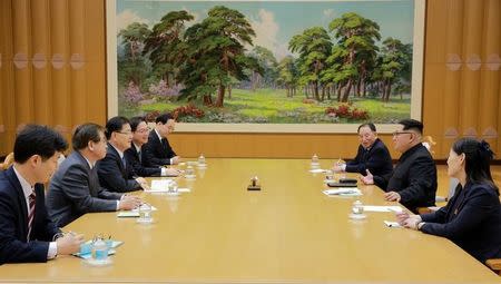 North Korean leader Kim Jong Un talks with the South Korean delegation led by Chung Eui-yong, head of the presidential National Security Office, in Pyongyang, North Korea, March 6, 2018. The Presidential Blue House/Yonhap via REUTERS