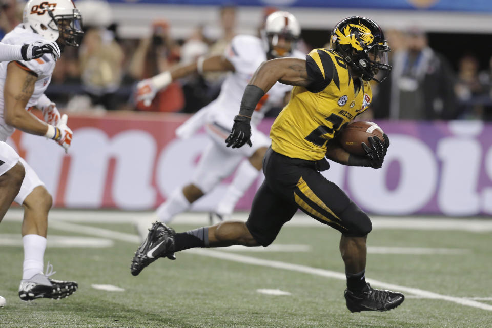 Missouri running back Henry Josey (20) goes in for a touchdown against Oklahoma State during the second half of the Cotton Bowl NCAA college football game, Friday, Jan. 3, 2014, in Arlington, Texas. (AP Photo/Brandon Wade)