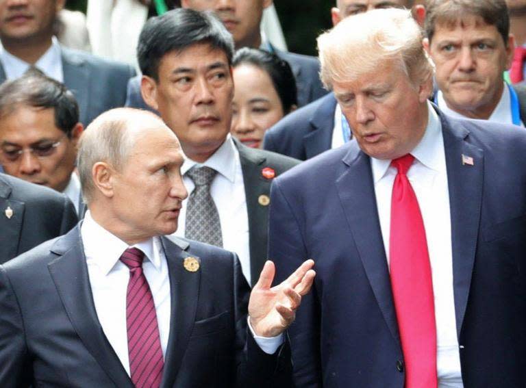 APEC summit: Donald Trump and Putin sign joint statement on Syria crisis after exchanging brief comments in Vietnam