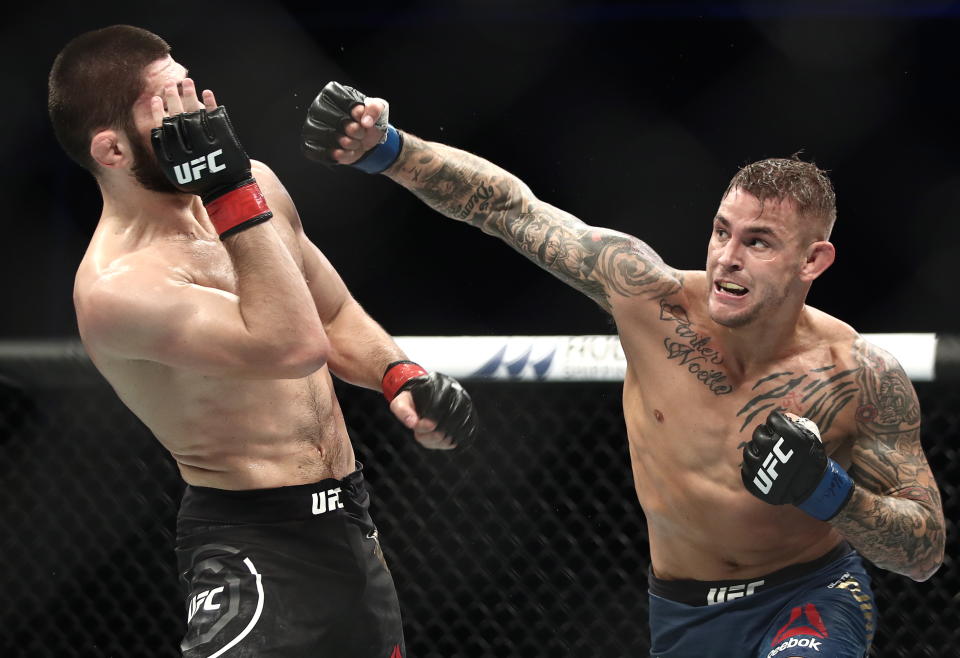 ABU DHABI, UNITED ARAB EMIRATES  SEPTEMBER 7, 2019: UFC lightweight champion Khabib Nurmagomedov (L) and interim UFC lightweight champion Dustin Poirier fight in their title unification bout at the UFC 242 mixed martial arts tournament. Valery Sharifulin/TASS (Photo by Valery Sharifulin\TASS via Getty Images)