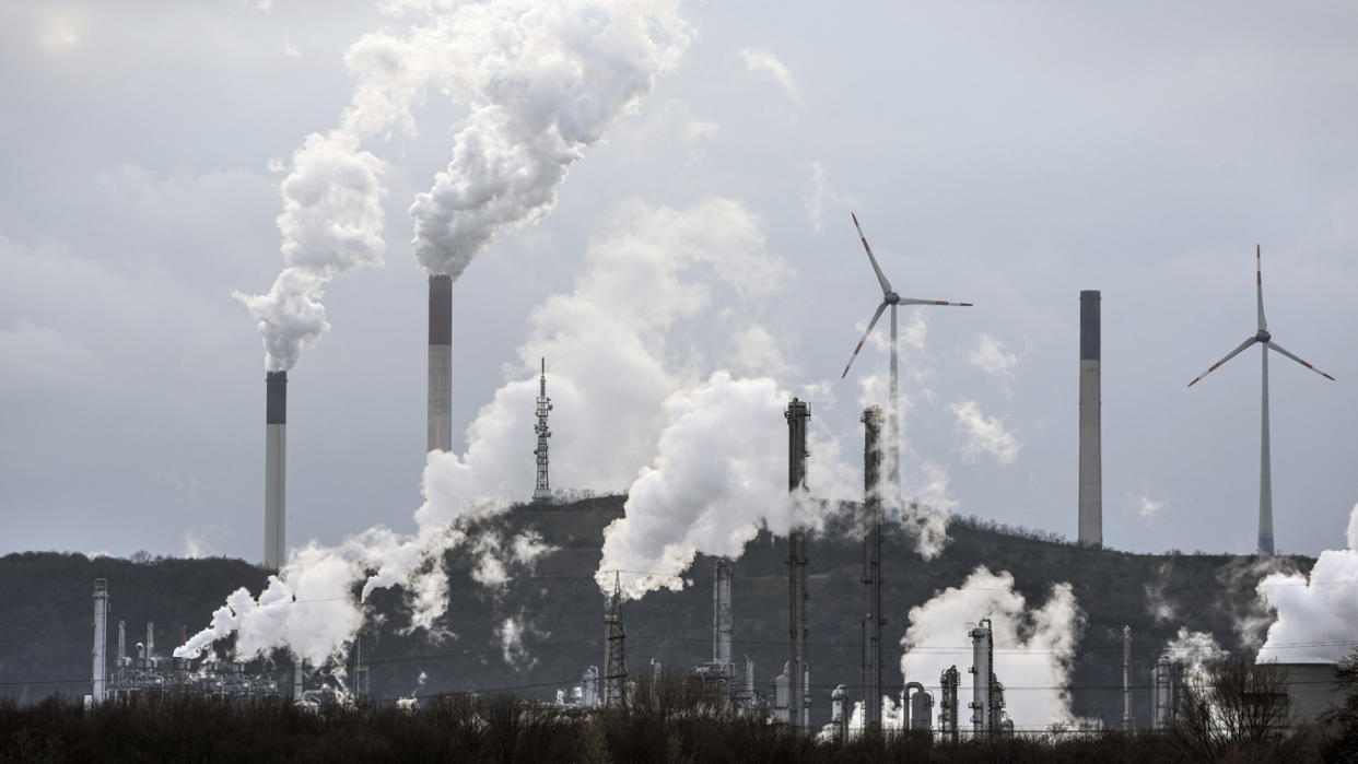 The industrial backdrop of a BP refinery and a Uniper coal-fired power plant.