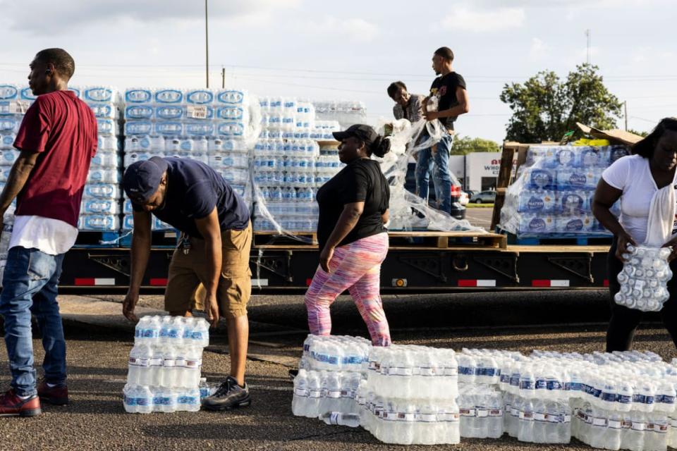<div class="inline-image__title">1242850326</div> <div class="inline-image__caption"><p>Cases of bottled water are handed out at a Mississippi Rapid Response Coalition distribution site on August 31, 2022 in Jackson, Mississippi. Jackson is experiencing a third day without reliable water service after river flooding caused the main treatment facility to fail. Late Tuesday night, President Joe Biden declared an emergency amid the crisis. </p></div> <div class="inline-image__credit">Photo by Brad Vest/Getty Images</div>