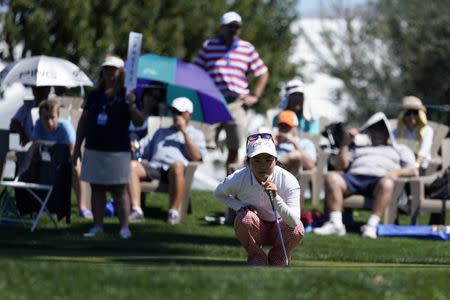 Mar 29, 2018; Rancho Mirage, CA, USA; Ayako Uehara lines up her putt on the 18th hole during the first round of the ANA Inspiration women's golf tournament at Mission Hills CC - Dinah Shore Tournament Course. Mandatory Credit: Kelvin Kuo-USA TODAY Sports