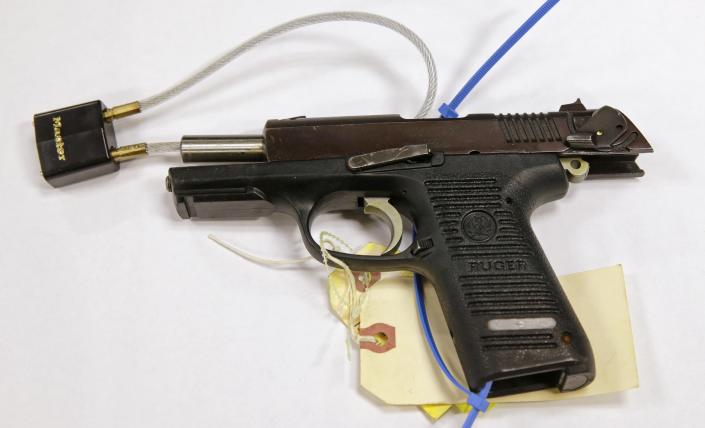 A Ruger pistol, that was shown during the Dzhokhar Tsarnaev federal death penalty trial, is displayed at a conference room at the John Joseph Moakley United States Courthouse in Boston, Tuesday, March 17, 2015. Stephen Silva said during testimony Tuesday that he loaned Tsarnaev a P95 Ruger pistol in February 2013. Authorities say the P-95 Ruger was the gun used to kill MIT police officer Sean Collier. (AP Photo/Charles Krupa)