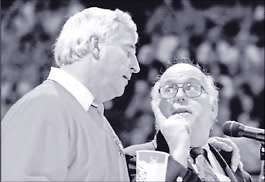 Indiana University basketball coach Bob Knight congratulates Bob Hammel on his retirement as sports editor of the Bloomington Herald-Times during a senior day ceremony in Assembly Hall March 10, 1996. Knight and Hammel became good friends during the coach’s 29-year reign at IU. David Snodgress