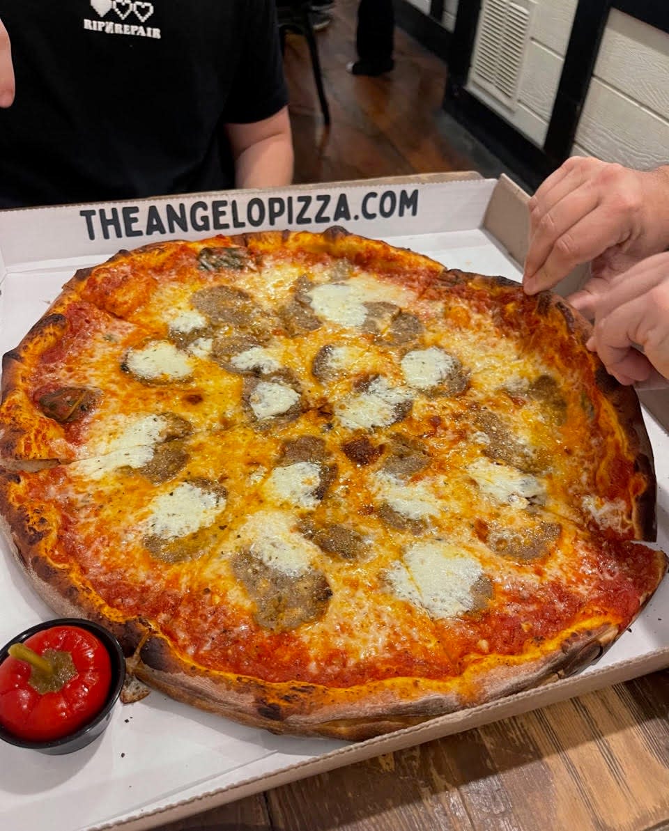 The Angelo Pizza offers a variety of pies inspired by family recipes, including The Paulie, topped with fresh mozzarella and thin-sliced meatballs made with beef, pork, and veal using a recipe created by Pizza’s grandfather.