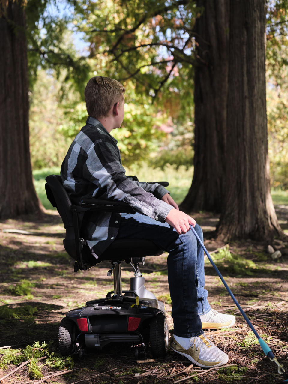 Ayden often uses a motorized chair to preserve energy.<span class="copyright">Julie Renée Jones for TIME</span>