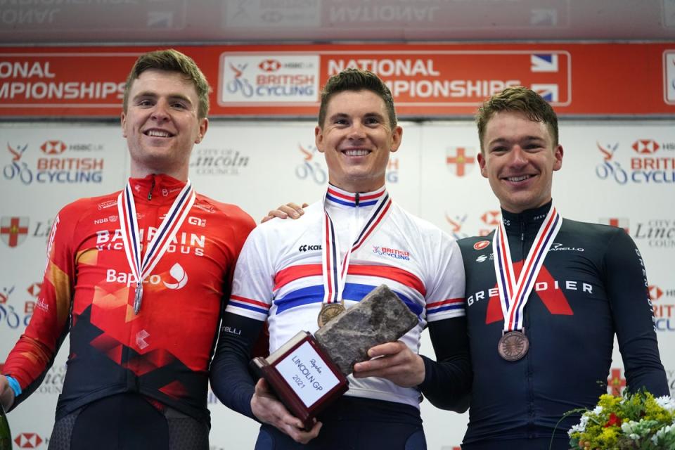 Wright, left, will race alongside Ben Swift, centre, and Ethan Hayter, right, in Australia (Tim Goode/PA) (PA Archive)