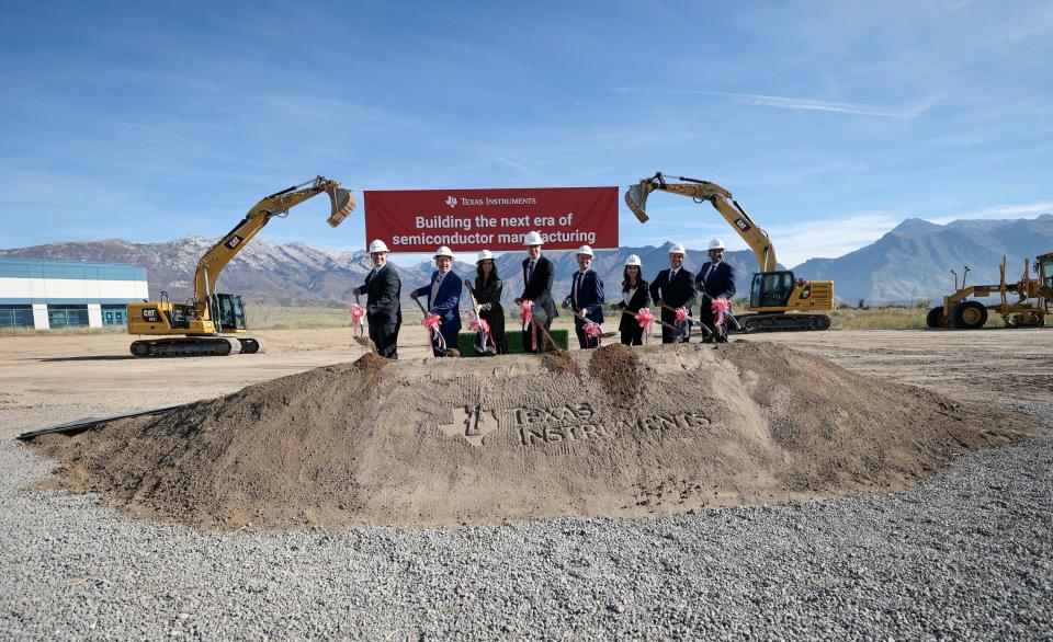 Trevor Bee, Alpine School District superintendent Dr. Shane Farnsworth, Christine Witzsche, Texas Instruments president and CEO Haviv Ilan, Gov. Spencer Cox, Virginia Schaefer, Kyle Flessner and Mohammad Yunus pose for a photo during a ground breaking ceremony for Texas Instruments’ second Utah semiconductor factory in Lehi on Thursday, Nov. 2, 2023. | Kristin Murphy, Deseret News