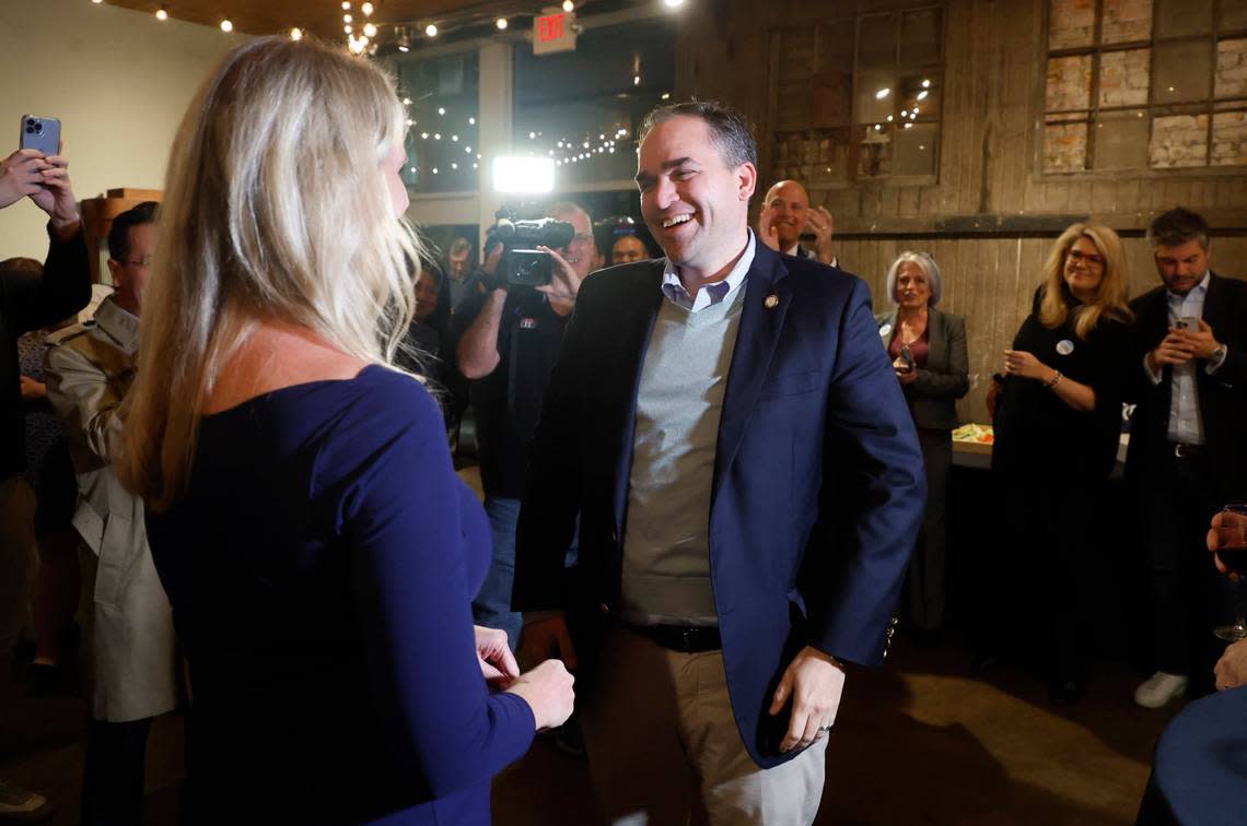 Wiley Nickel laughs with his wife, Caroline, as he greets supporters at a campaign party at Sitti in Raleigh, N.C., Tuesday, Nov. 8, 2022.