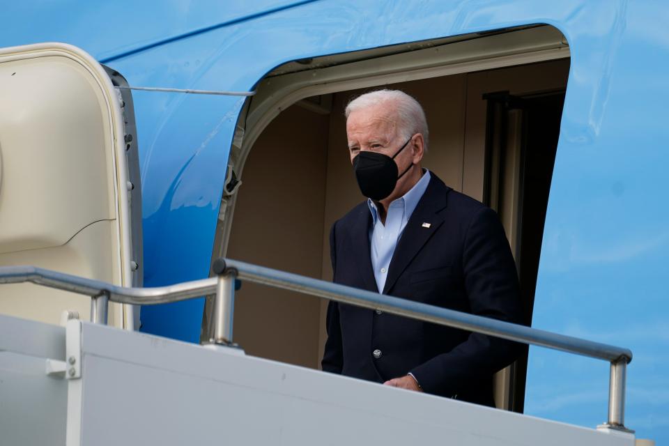 President Joe Biden exits Air Force One as he arrives in Fort Campbell, Ky., Wednesday, Dec. 15, 2021, to survey storm damage from tornadoes and extreme weather. (AP Photo/Andrew Harnik)