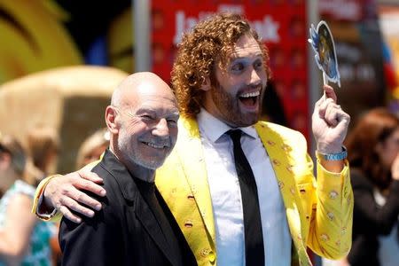 Cast members Patrick Stewart (L) and T.J. Miller attend the premiere for "The Emoji Movie" in Los Angeles, California, U.S., July 23, 2017. REUTERS/Mario Anzuoni/Files