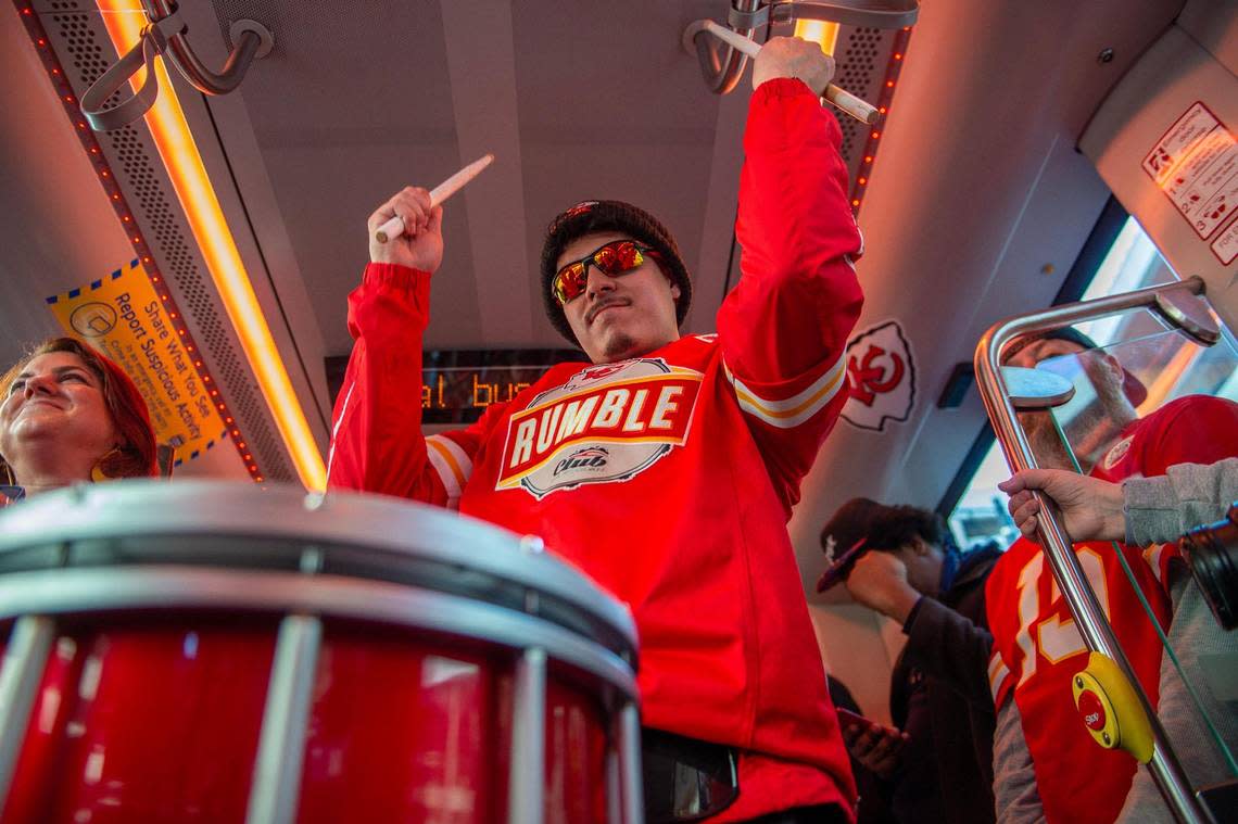Rafael Chinnery, drummer for the Rumble drum corp for the Kansas City Chiefs, rode the KC Streetcar during a Red Friday rally on Feb. 10, 2023, in Kansas City. The drummers were on the streetcar for a rolling Red Friday rally to fire up Chiefs fans for Super Bowl LVII.