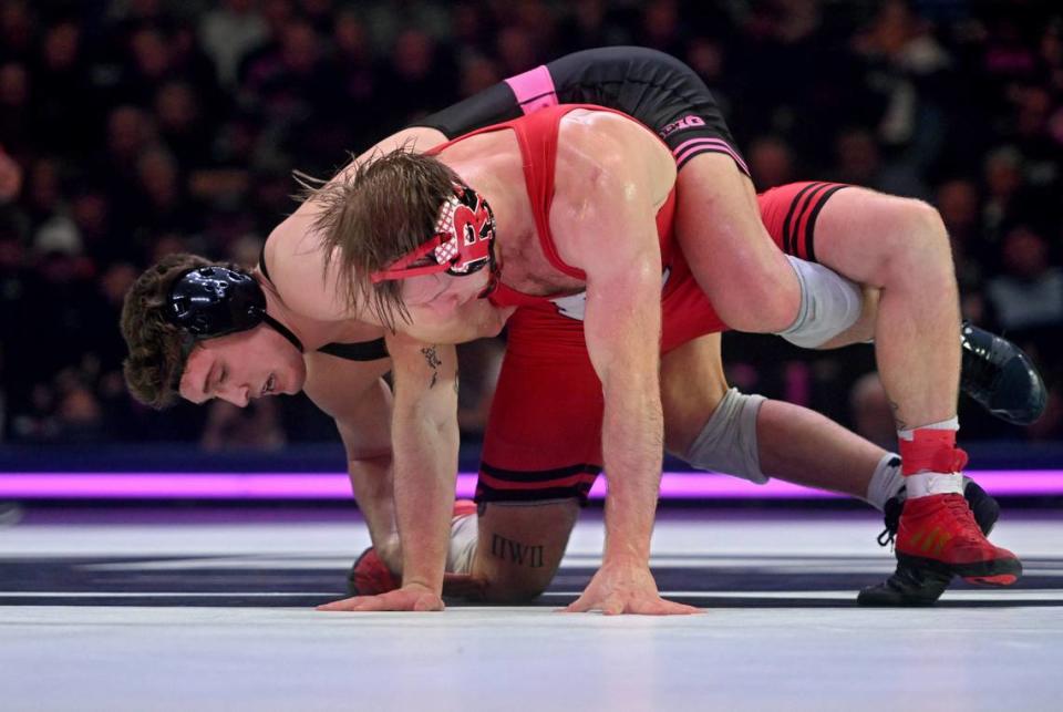 Penn State’s Terrell Barraclough controls Rutgers’ Jackson Turley in the 174 lb bout of the match on Monday, Feb. 12, 2024 at the Bryce Jordan Center.