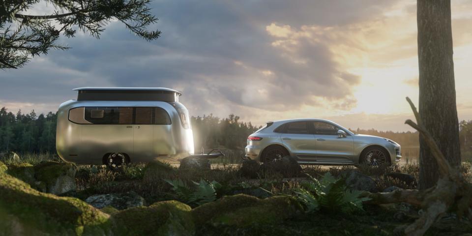 A rendering of the Airstream Studio F. A. Porsche Concept Travel Trailer next to a car.