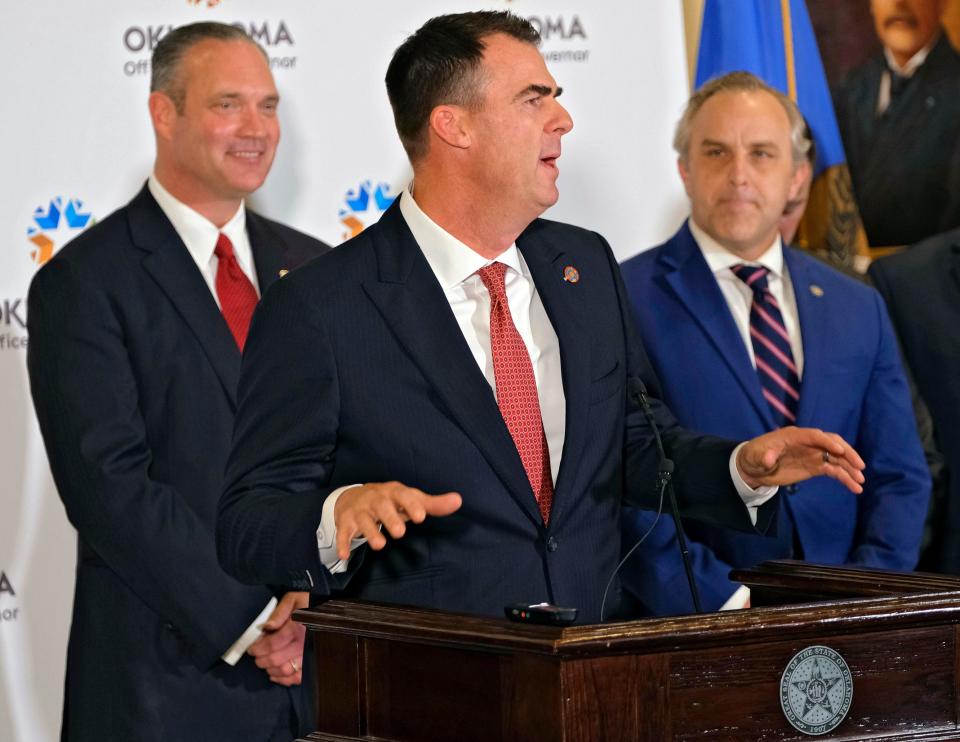 Gov. Kevin Stitt, Senate President Pro Tem Greg Treat and House Speaker Charles McCall announce a historic education reform agreement at a Monday news conference.