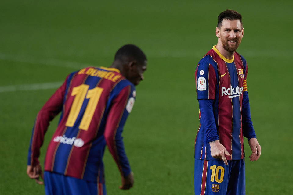 Lionel Messi of Barcelona looks to Ousmane Dembele during the Copa del Rey Semi Final Second Leg match between FC Barcelona and Sevilla at Camp Nou on March 3, 2021 in Barcelona, Spain. Sporting stadiums around Spain remain under strict restrictions due to the Coronavirus Pandemic as Government social distancing laws prohibit fans inside venues resulting in games being played behind closed doors. (Photo by Jose Breton/Pics Action/NurPhoto via Getty Images)