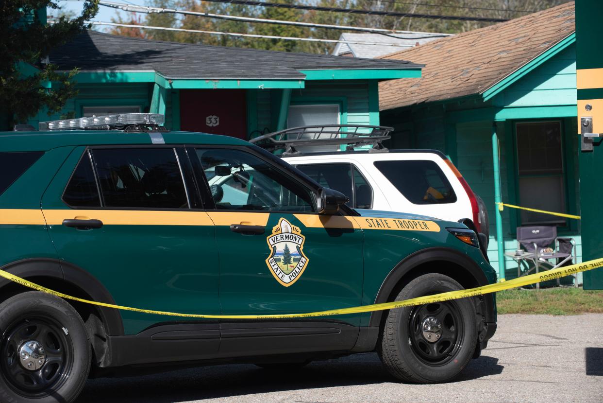 Crime scene tape runs besides a Vermont State Police vehicle on Monday, Oct. 3, 2022,  at the Swiss Host Motel and Village on Williston Road in South Burlington.