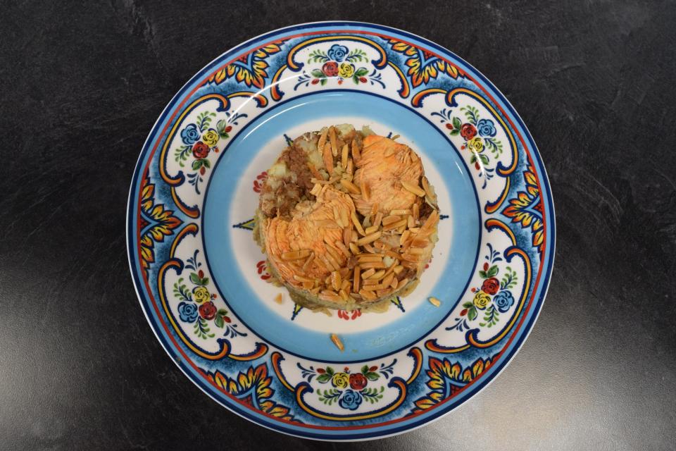 The Maqluba Bowl at Yusuf's Cuisine comes with rice, roasted almonds, a variety of vegetables and chicken. The restaurant opened for dining in early May.