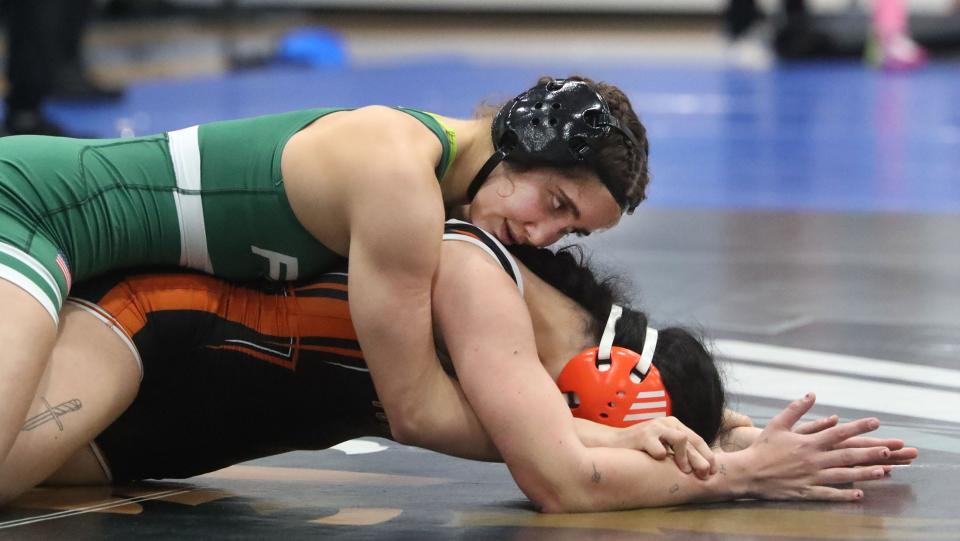 Flagler Palm Coast's Ana Vilar wraps up Tocoi Creek's Saniyah Callahan, Thursday, Jan. 18, 2024 during the Pat White Memorial girls wrestling event at Matanzas High School in Palm Coast.