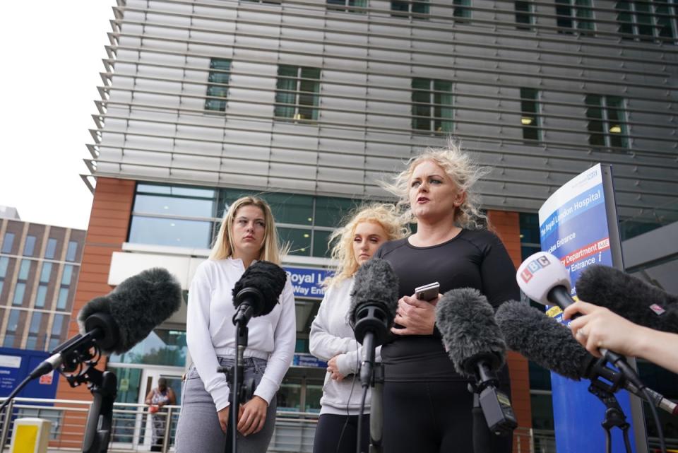 The mother of Archie Battersbee, Hollie Dance, right, speaks to the media outside the Royal London Hospital in Whitechapel, east London (Dominic Lipinski/PA) (PA Wire)