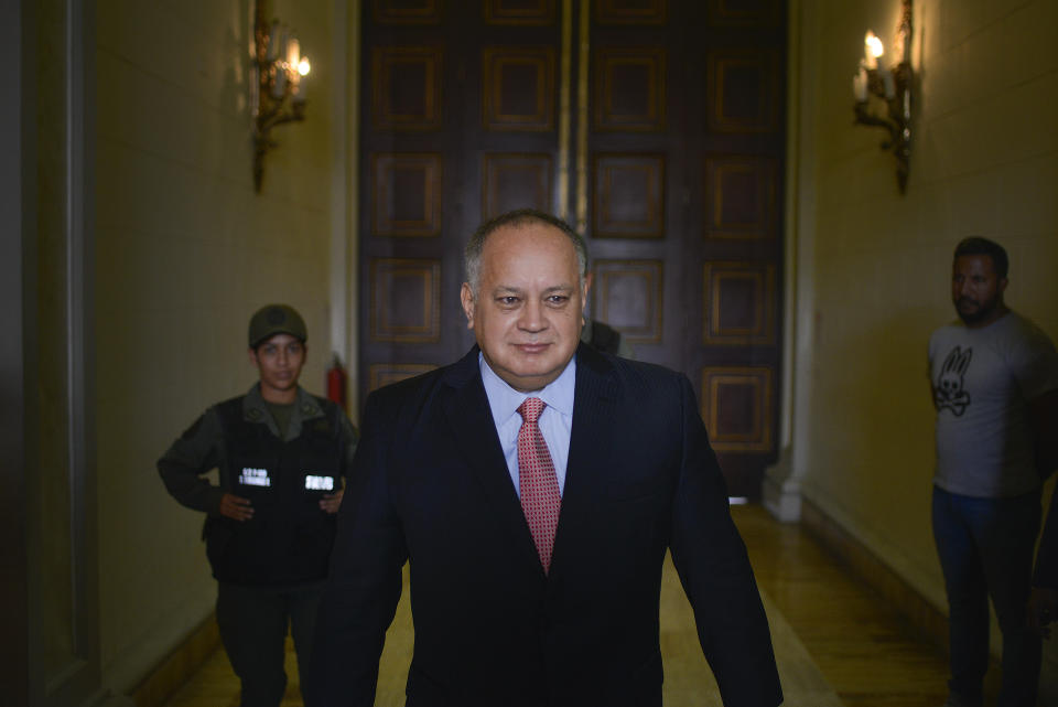 Diosdado Cabello, president of the National Constituent Assembly, leaves after giving a press conference at the National Assembly in Caracas, Venezuela, Wednesday, Jan. 8, 2020. A fight for control of the legislature comes as the opposition is struggling to regain its momentum, nearly a year after opposition leader Juan Guaido declared himself interim president of the nation. (AP Photo/Matias Delacroix)