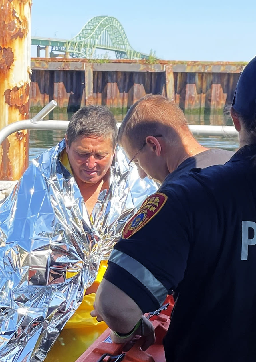 Dan Ho after he was pulled out of the water on Monday morning. (SCPD)