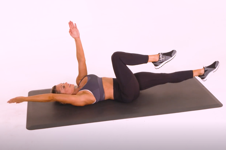 woman doing dead bug exercise for back pain