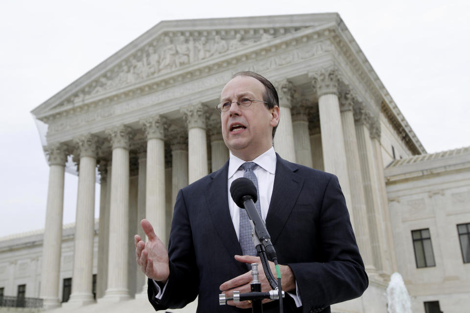 FILE - In this March 28, 2012, file photo Paul Clement, the lawyer representing states opposed to the Patient Protection and Affordable Care Act, talks to media outside the Supreme Court in Washington at the end of arguments on the law's constitutionality. Chances are bleak that Congress would act to restore any parts of the law that the court might strike down, one reason why Justice Ruth Bader Ginsburg told Clement, "So why should we say, it's a choice between a wrecking operation, which is what you are requesting, or a salvage job." She added, "And the more conservative approach would be salvage rather than throwing out everything." (AP Photo/Charles Dharapak, File)