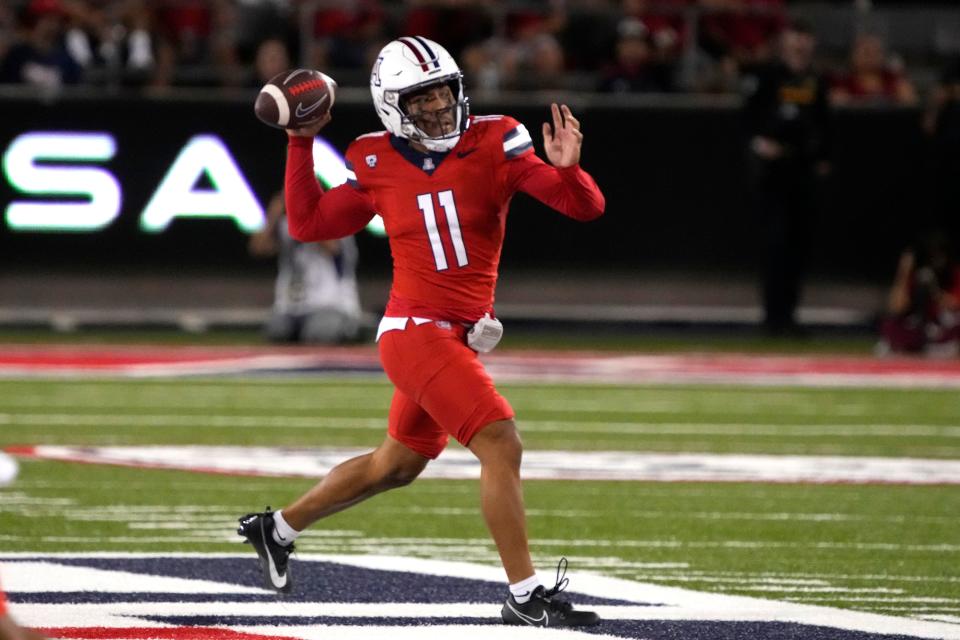 Arizona quarterback Noah Fifita (11) in the first half during an NCAA college football game against Washington, Saturday, Sept. 30, 2023, in Tucson, Ariz. (AP Photo/Rick Scuteri)