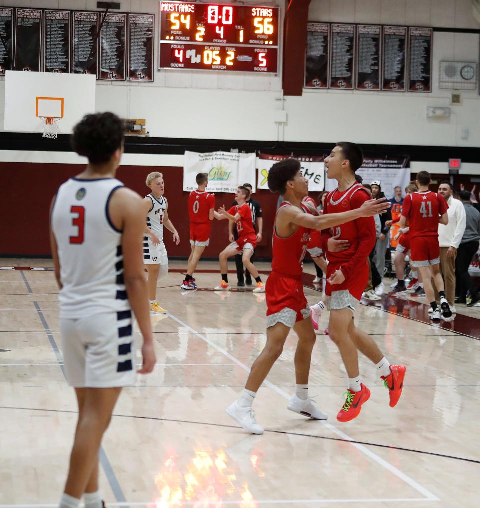 Tulare Western's Malachi Ficher can only watch as North celebrates their victory at the buzzer during their 72nd annual Polly Wilhelmsen Invitational Basketball Tournament championship game in Visalia, Calif., Saturday, Dec. 30, 2023.