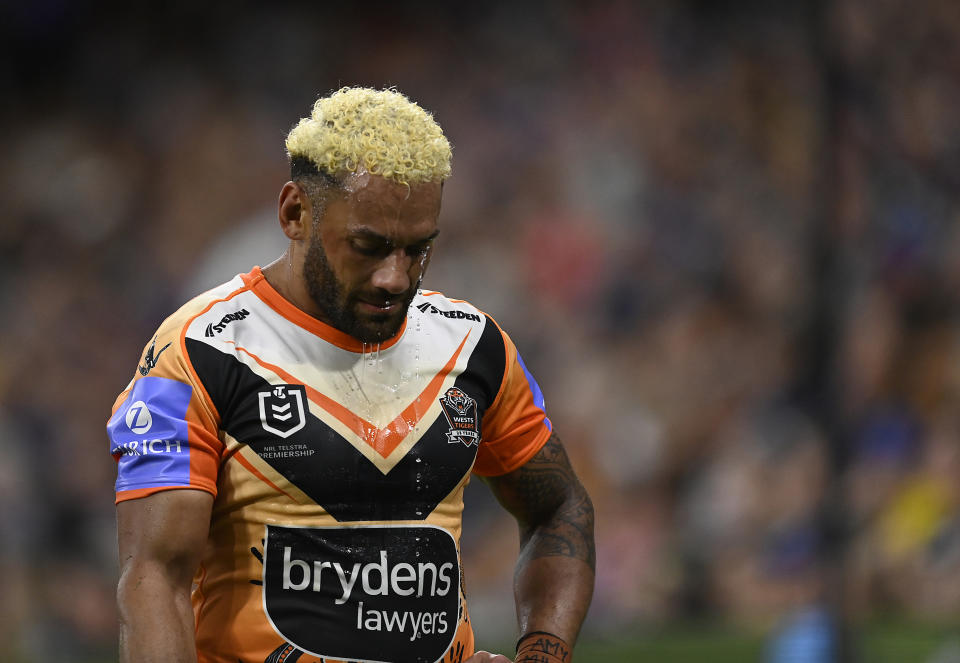 TOWNSVILLE, AUSTRALIA - MAY 24: Apisai Koroisau of the Tigers walks from the field during the round 12 NRL match between North Queensland Cowboys and Wests Tigers at Qld Country Bank Stadium, on May 24, 2024, in Townsville, Australia. (Photo by Ian Hitchcock/Getty Images)