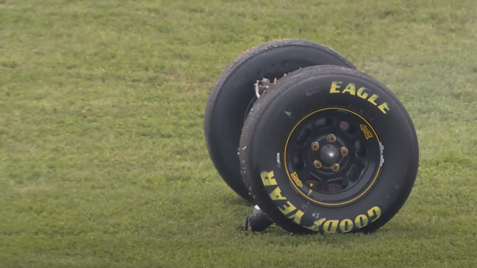 a tire on a grass field