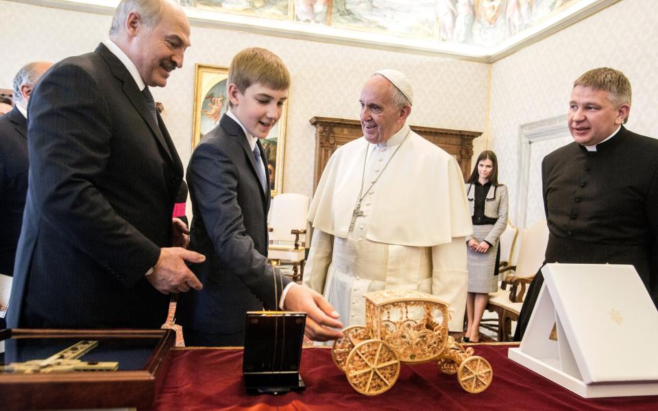 Pope Francis exchanges gifts with President of Belarus Alexander Lukashenko and his son Nikolai - Getty Images Europe 