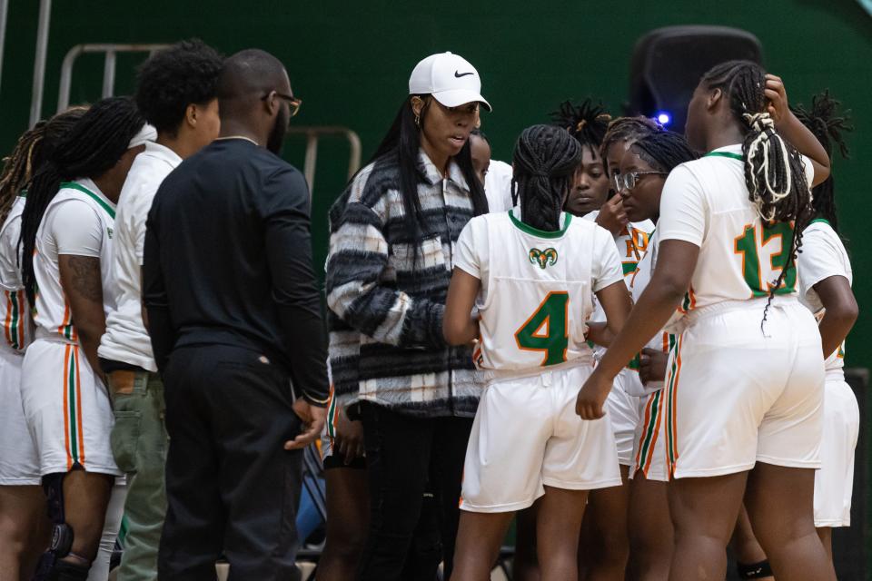 Eastside Rams head coach Lonna Turner talks with her team during a timeout during the first half against the P.K. Yonge Blue Wave at Eastside High School in Gainesville, FL on Friday, January 5, 2024. [Matt Pendleton/Gainesville Sun]