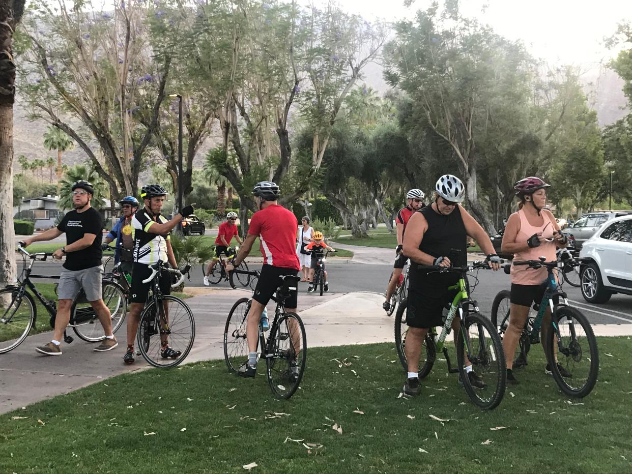 Cyclists arrive from their ride after participating in Ride of Silence, an event to raise public awareness of cycling safety in Palm Springs, Calif., on May 18, 2022.