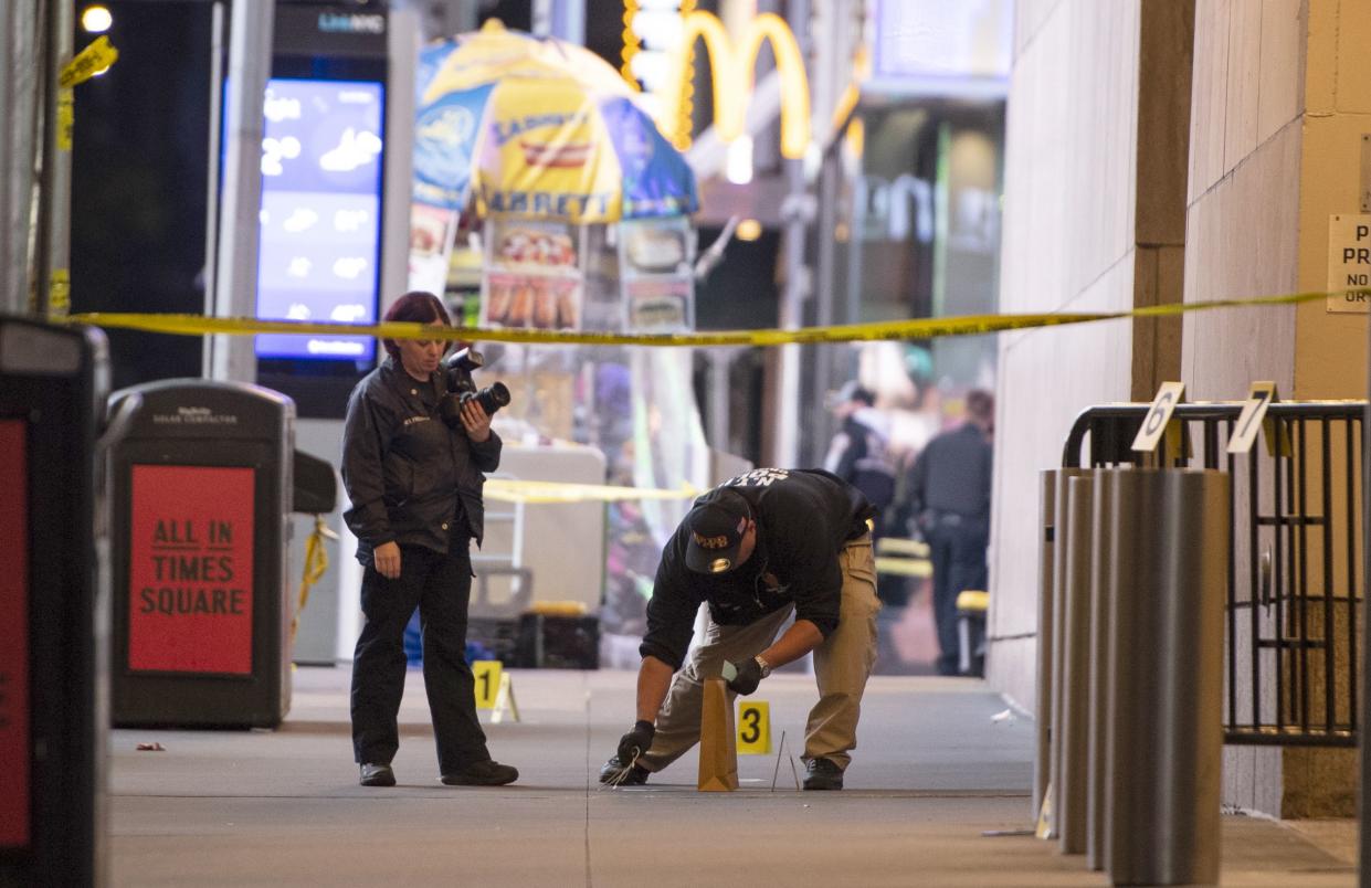 Shell casings were found on the sidewalk of 45th Street near 7th Avenue in Manhattan, after a shooting in Times Square on Saturday. 