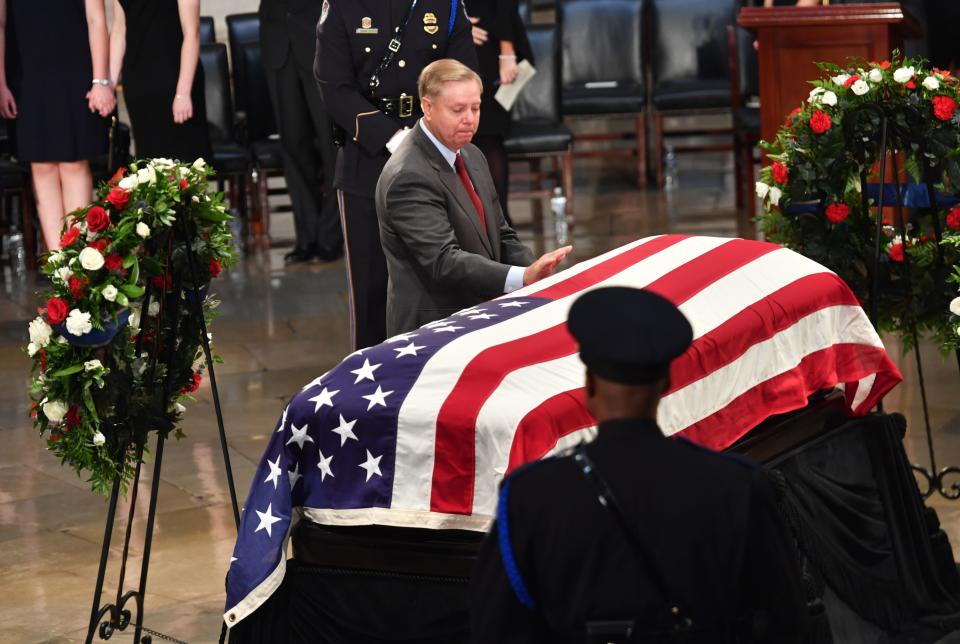 <p>Sen. Lindsey Graham pays his respects during ceremonies honoring the late Sen. John McCain at the U.S. Capitol Rotunda in Washington, D.C., Aug. 31, 2018. (Photo: Nicholas Kamm/AFP/Getty Images) </p>