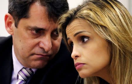 Civil Police Chief Fernando Veloso (L) and Police Chief for crimes against minors Cristiana Honorato attend a news conference on the investigations on the gang rape of a teenage girl after a video of the assault circulated widely on social media in Rio de Janeiro, Brazil, May 30, 2016. REUTERS/Sergio Moraes