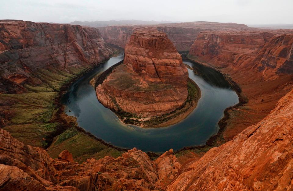 The Colorado River wraps around Horseshoe Bend in the in Glen Canyon National Recreation Area in Page, Arizona, on February 11, 2017.